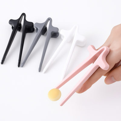 Finger Chopsticks in pink, black, white, and gray — snack tool for clean fingers while gaming or reading